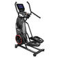 Bowflex Max Trainer M9 elliptical with gray and black frame, digital touchscreen display, curved handles, and red accent whee