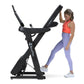 Black BowFlex T9 treadmill with digital display worn by woman in red tank top and lavender leggings on white background