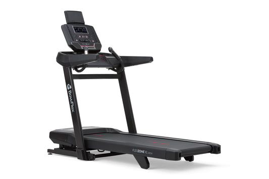 Black Bowflex T9 treadmill with digital console display, cushioned running deck, and handlebars on white background