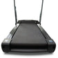 Black folding treadmill with gray rails and dual handles, textured running belt on white background