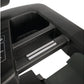 Black treadmill cup holder and storage compartment with chrome accents, open drawer detail