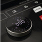 Round black digital timer with white LED display showing time, mounted on treadmill control panel with buttons and red emerge