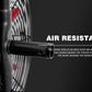 Stationary exercise bike with gray frame, black textured pedals, and red and white fan cage on dark background