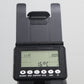 Black rowing machine console with LCD display showing time, distance, and calorie metrics, adjustable arm handles, and contro