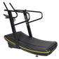 Black curved treadmill with yellow trim, dual handles, and digital display console on white background