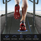 Runner's legs on red and white running shoes on curved treadmill belt with road landscape in background, showing 59 inch heig