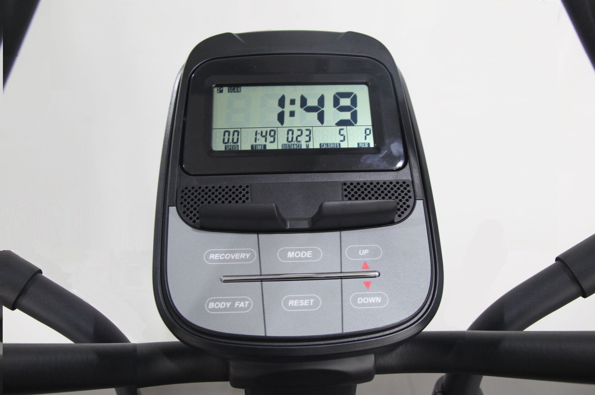 Black and gray elliptical machine console displaying digital time and fitness metrics with labeled control buttons including 