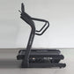 California Fitness IT8 black incline treadmill with curved running deck and dual handles, angled view on gray background