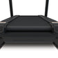 Black incline trainer treadmill with dual antennas, textured running deck, and wide base on white background