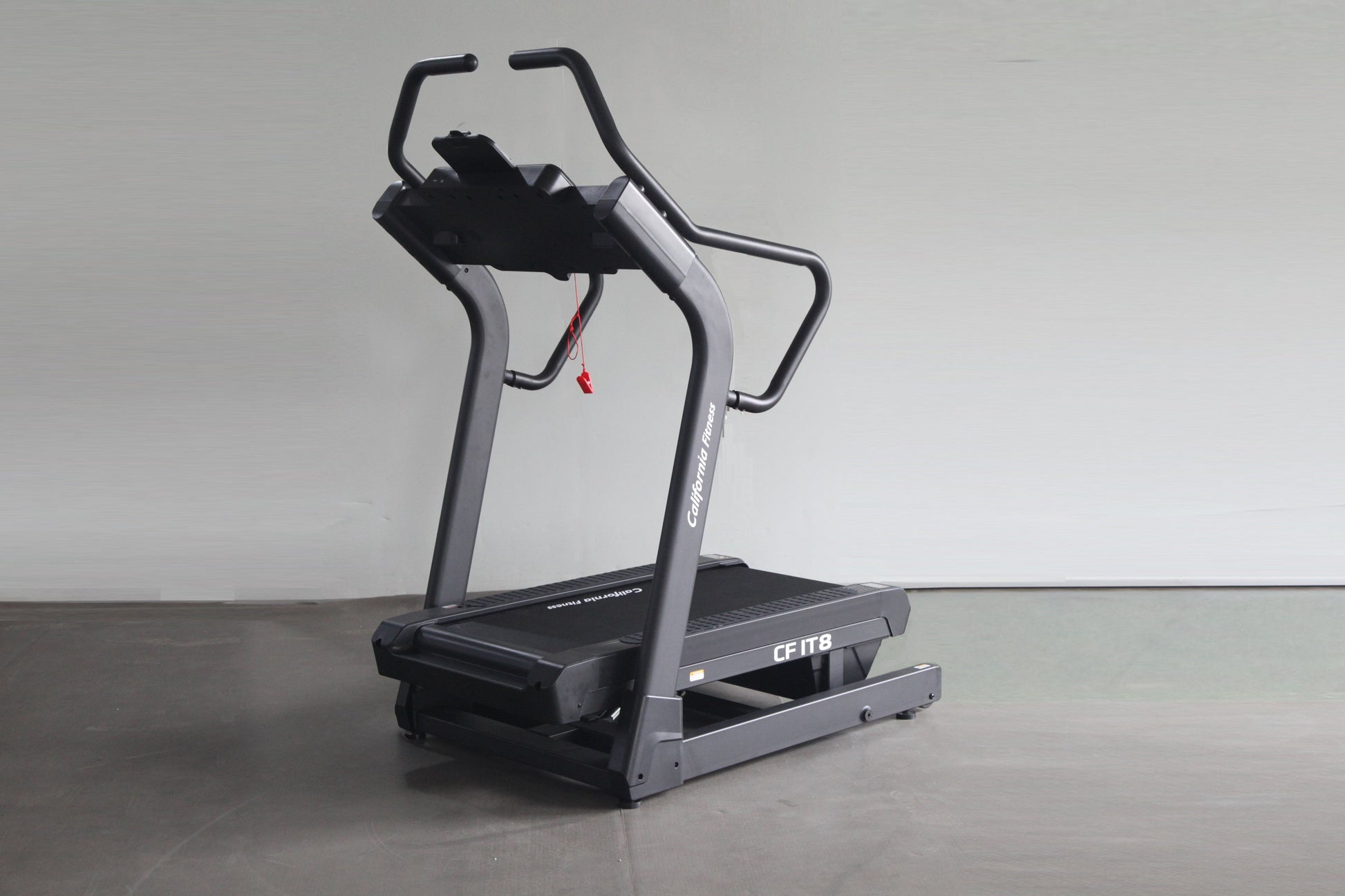 California Fitness IT8 Incline Trainer Treadmill with black running deck, gray frame, and curved handles on white background