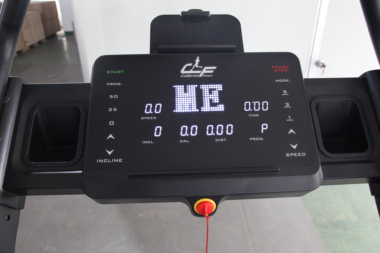 California Fitness IT8 black treadmill console with LED display showing incline mode, speed and time controls, start and paus