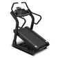 Black incline trainer treadmill with digital display console, curved handrails, and textured running belt on white background