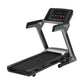 Black and gray motorized treadmill with digital touchscreen console displaying colorful icons, on white background