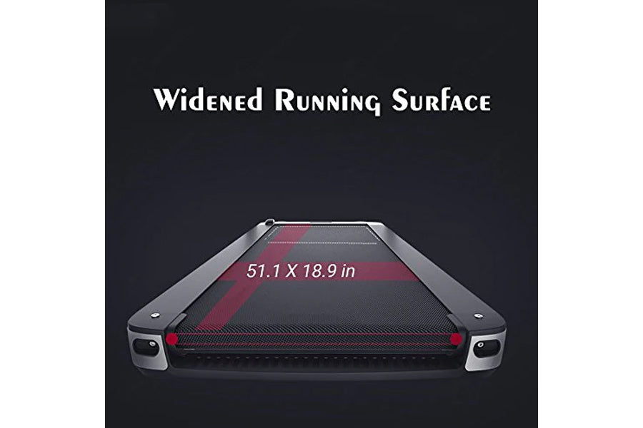 Folding treadmill with widened running surface measuring 51.1 x 18.9 inches, gray frame with red and black belt on dark backg