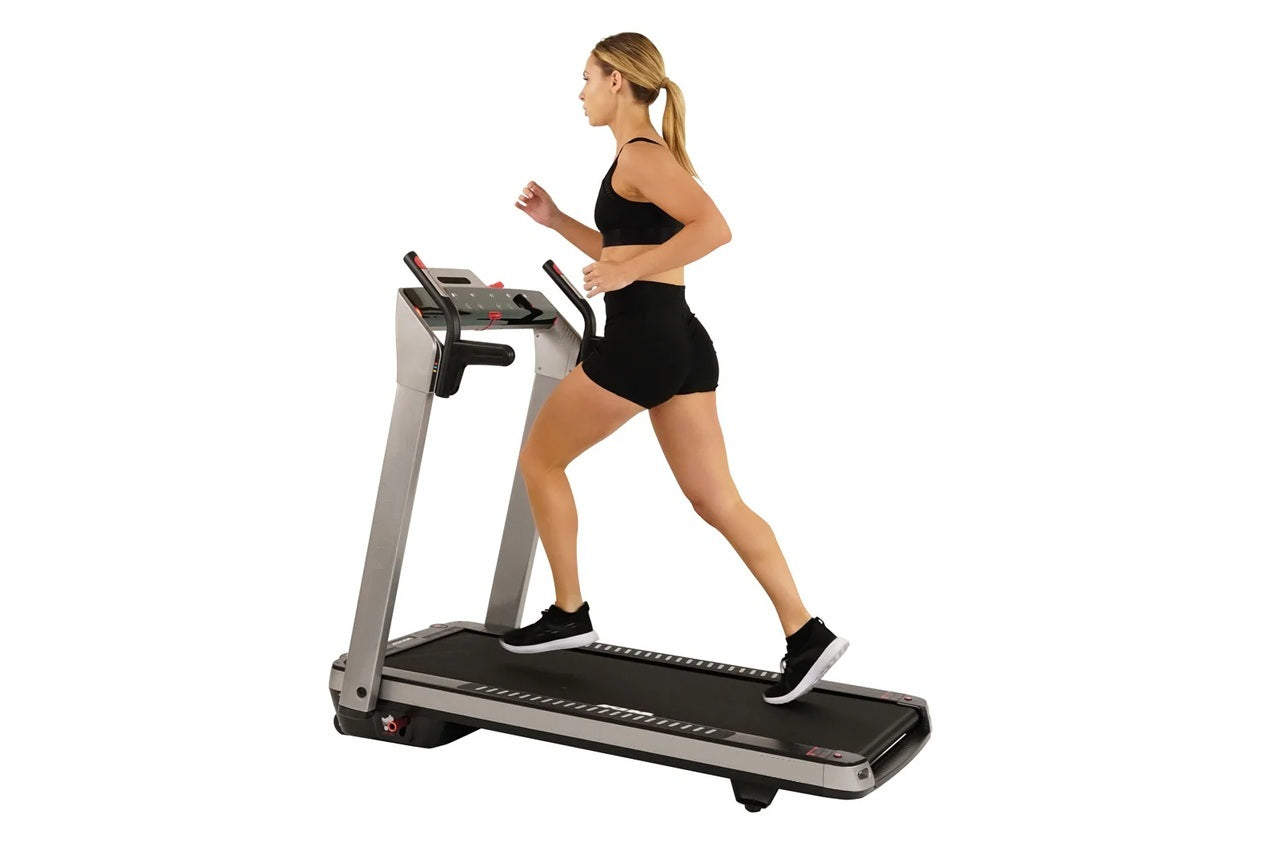 California Fitness M7 folding treadmill showing sleek design and compact home gym setup