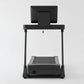 Black folding treadmill with digital display console mounted on top and cushioned running deck, front view on white backgroun