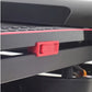 Bright red magnetic safety clip attached to gray folding treadmill console with black trim