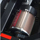 Cylindrical motor with vertical metal cooling fins, red accent panel, and black housing mounted in treadmill frame assembly