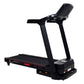 Black folding treadmill with digital display console, handrails, and red accent stripe on running deck, on white background