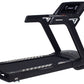 Black motorized treadmill with digital display console, cushioned running deck, and sturdy frame on white background
