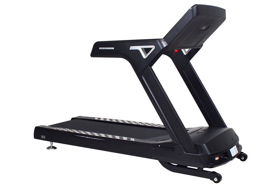 Black motorized treadmill with digital console, angled handrails, and cushioned running deck on white background