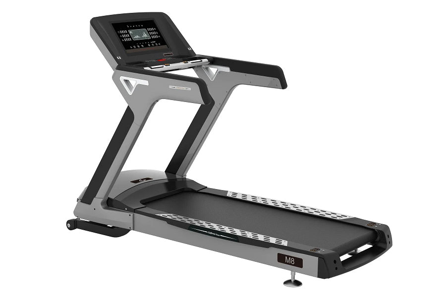 Gray and black motorized treadmill with digital display console, handrails, and black running belt on white background