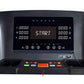 Treadmill console display with black frame showing START button, digital readouts, and control buttons on dark background