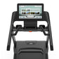 Black motorized treadmill with touch screen console displaying "Vision Run" interface, dual handles, and gray running deck on