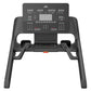Black treadmill with digital console displaying distance, time, steps, calories, and pace metrics, dual grip handles, and con