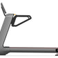 Gray and black motorized treadmill with curved handles and M9 digital console on white background