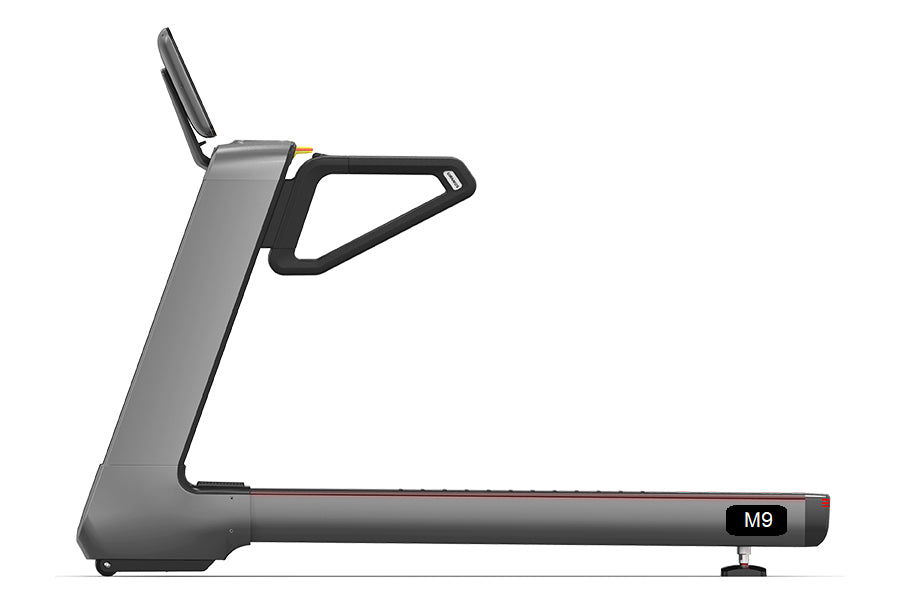 Gray and black motorized treadmill with curved handles and M9 digital console on white background