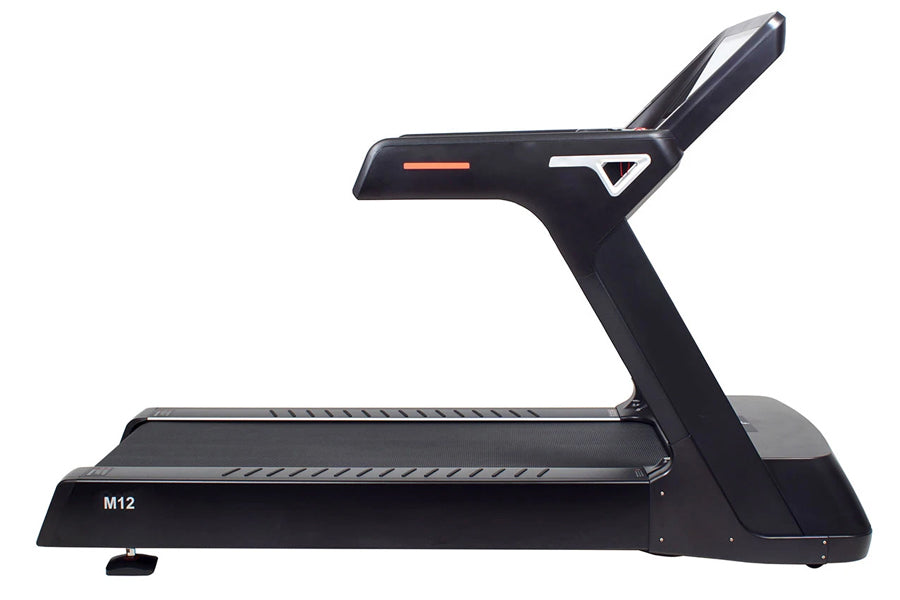 Black M12 treadmill with curved running deck and upright handlebar featuring orange accent detail, on white background