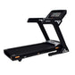 Black folding treadmill with digital touch console, orange accents, and wide running deck on white background