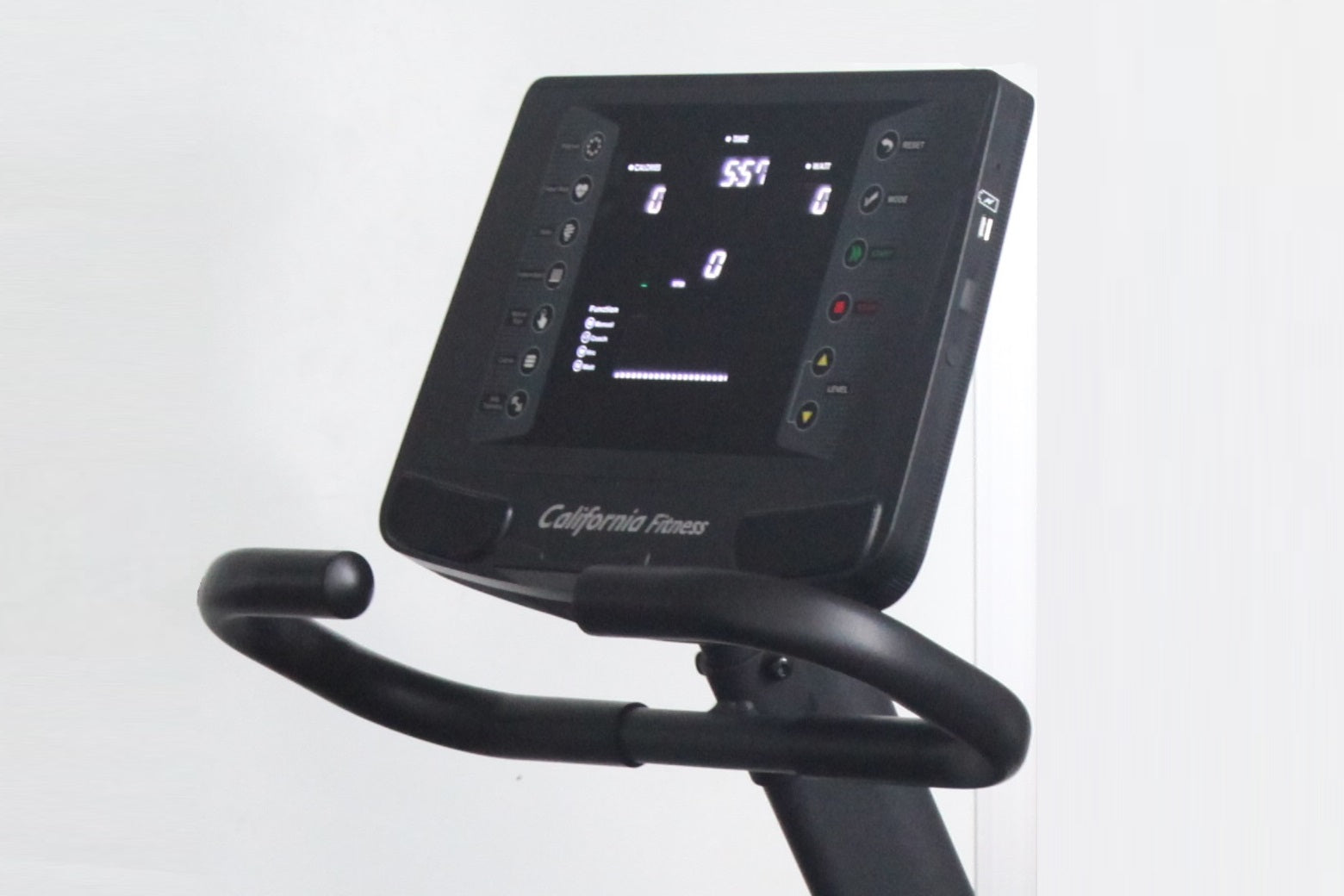 California Fitness R8 black recumbent exercise bike with digital display showing metrics and side control panels on white bac