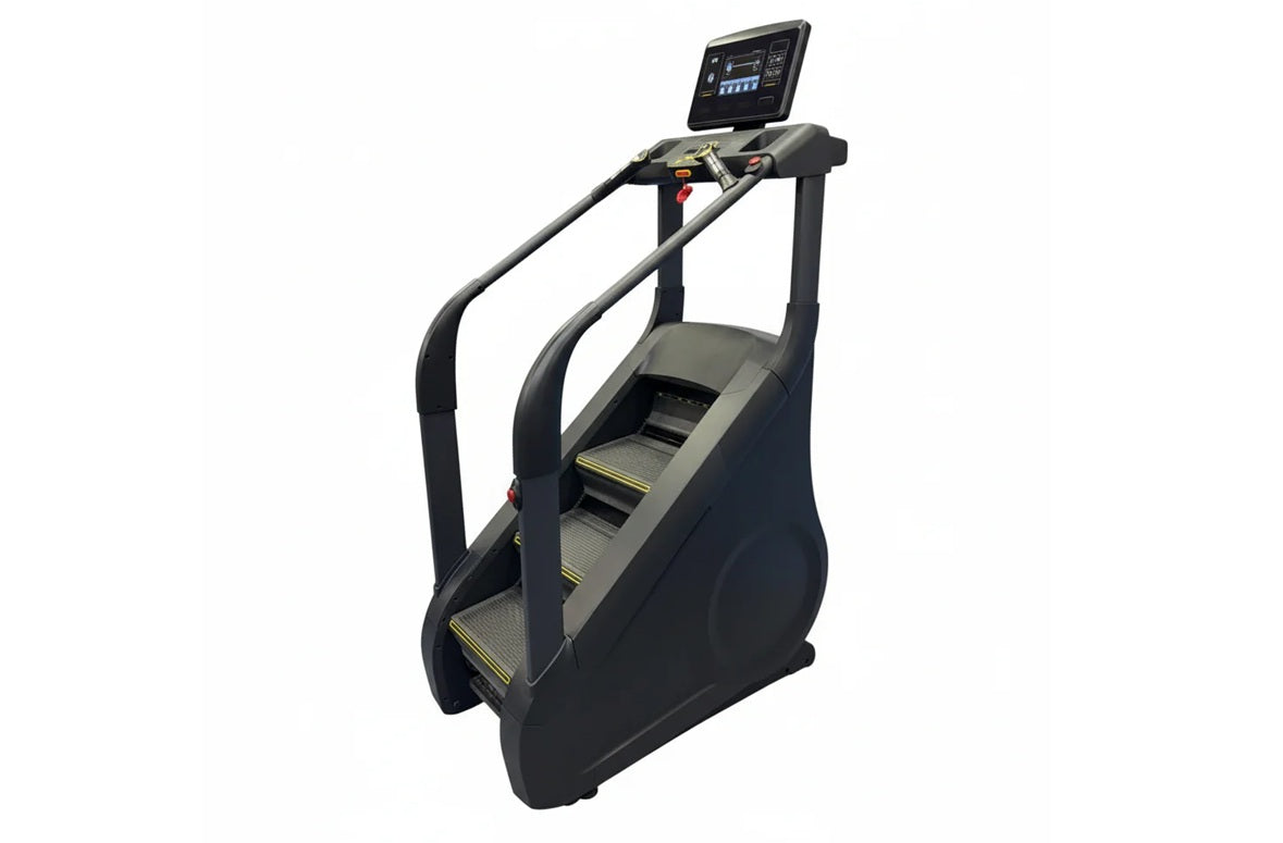Black and gray commercial stair climber with dual handrails, textured steps, and digital touchscreen display on white backgro