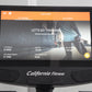California Fitness U8 upright exercise bike with black frame and touchscreen display showing training interface with orange n