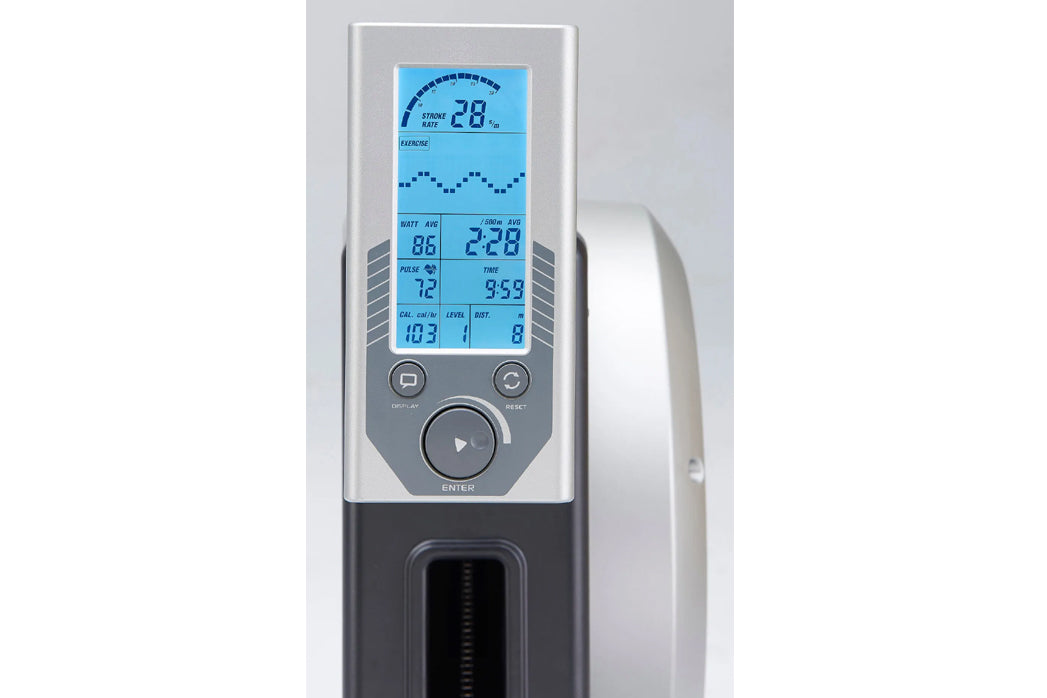 Digital exercise machine console with blue LCD screen displaying stroke rate, time, distance, and heart rate metrics, silver 