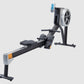 Malibu V6 Hybrid rowing machine with black frame, orange accents, digital display console, and flywheel monitor on white back