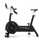 Concept2 BikeErg stationary exercise bike with black frame, white handlebar stem, drop-style handlebars, black seat, and larg