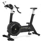 Concept2 BikeErg stationary exercise bike with black frame, gray accents, curved handlebars, and large black flywheel, on whi