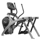 Cybex 525AT Total Body Arc Trainer elliptical with gray and black frame, digital console, and dual moving handlebars on white
