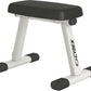 Cybex weight training bench with black padded seat, white metal frame, and black rubber feet on white background