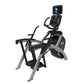 Cybex R Series lower body arc trainer elliptical with black seat and handles, gray frame, digital console mounted on top, on 