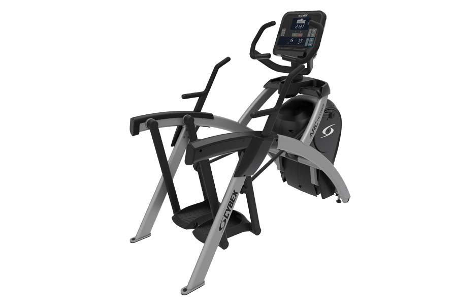 Cybex R Series lower body arc trainer elliptical with silver frame, black foot pedals, and digital display console on white b