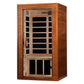 Hemlock wood sauna cabin with glass door and infrared heating panels visible inside, on white background