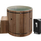 Wooden hot tub with two steps and a control box
