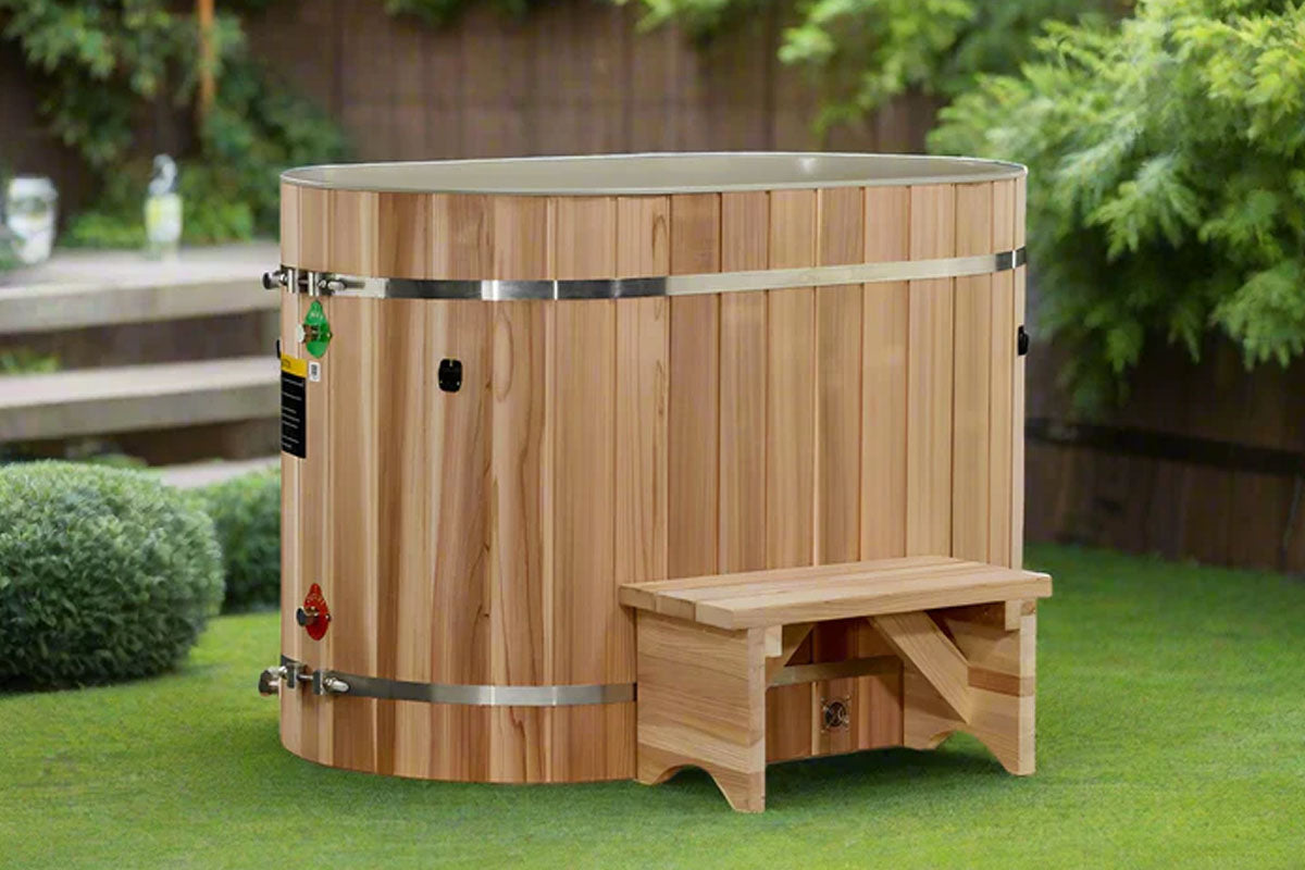 Cedar wood cold plunge barrel with metal bands and integrated bench, displayed in backyard setting