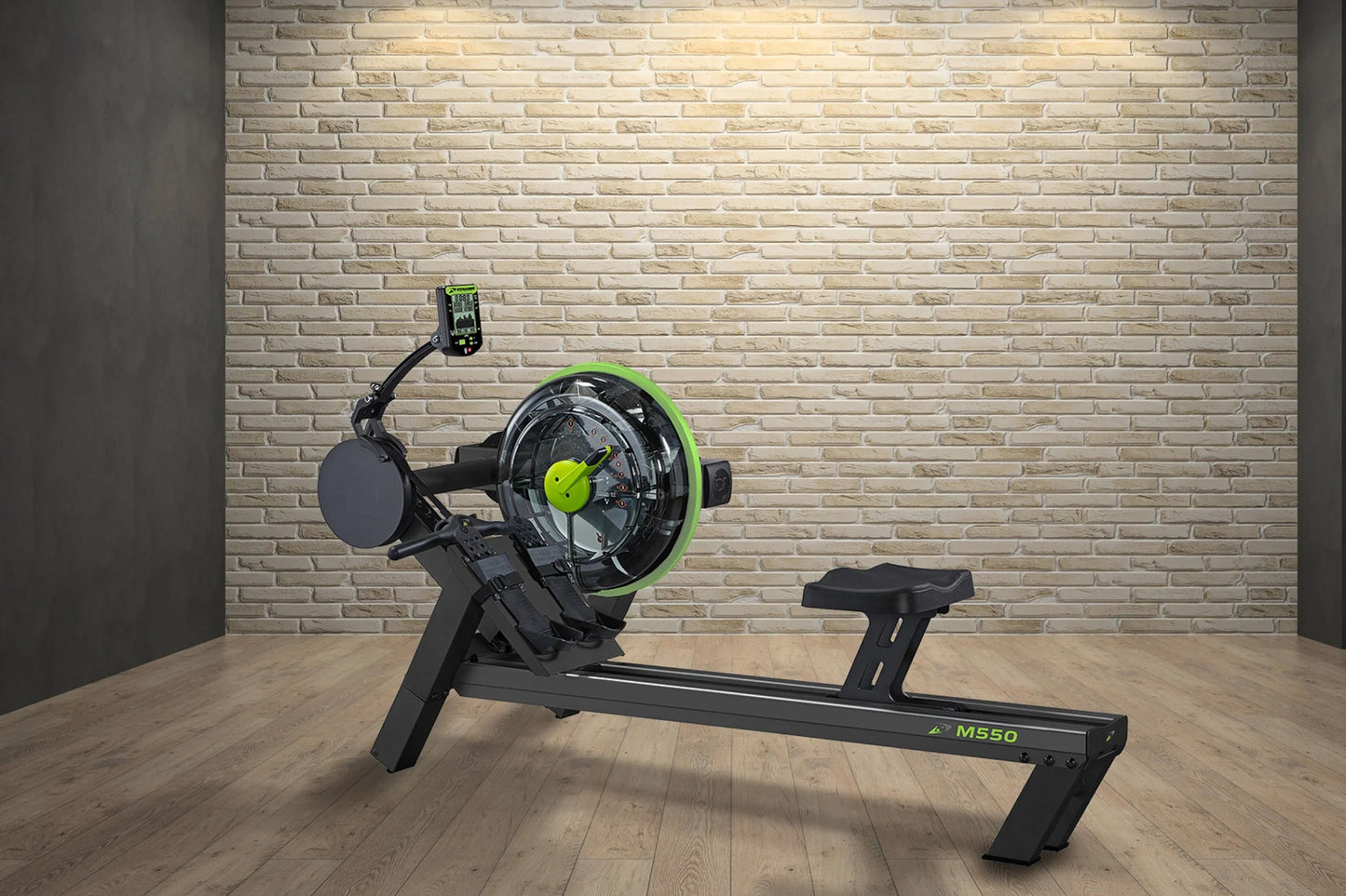 Black rowing machine with lime green accents and digital display, shown on wooden floor against cream brick wall