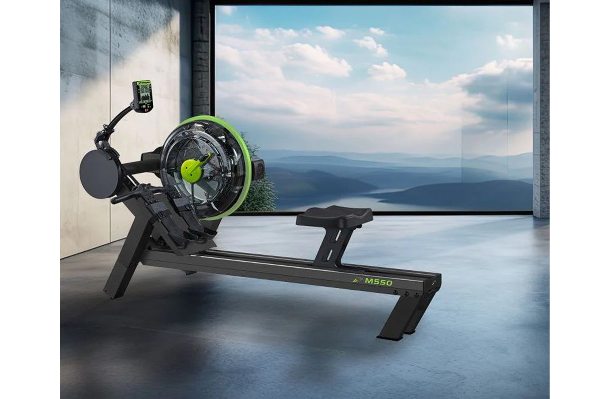 Black and neon green M550 rowing machine with digital display and resistance wheel, side view on concrete floor