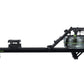 Black water rowing machine with transparent water tank and green accents, side view on white background